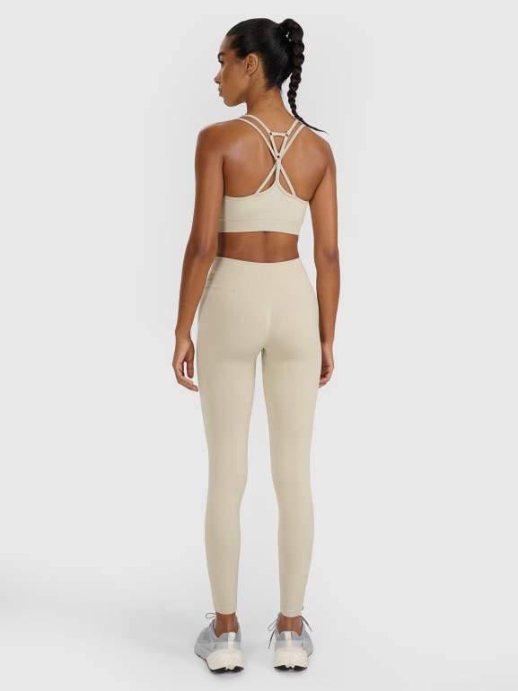 Damskie legginsy treningowe 4F 4FRAW25TFTIF445 - beżowy