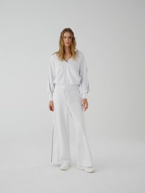 Damskie spodnie dresowe 4F 4FRAW25TTROF1577 - białe