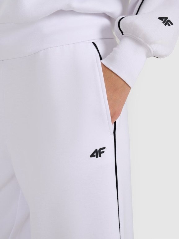 Damskie spodnie dresowe 4F 4FRAW25TTROF1577 - białe