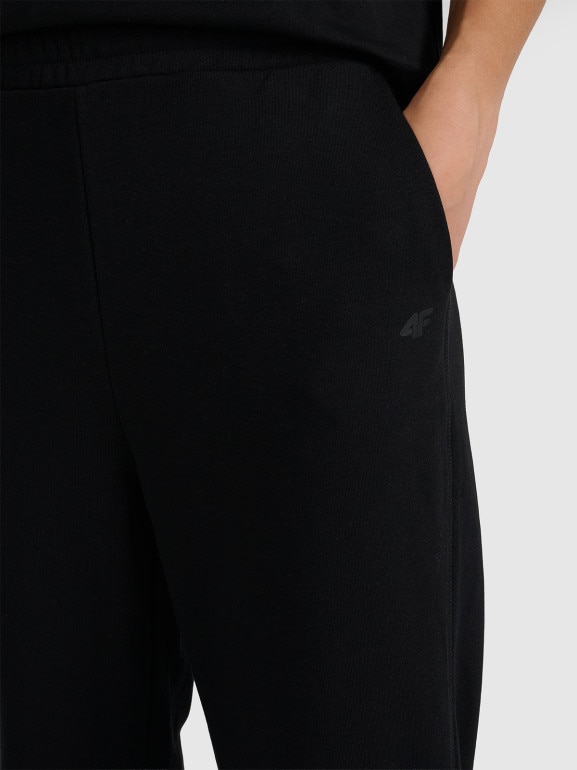 Damskie spodnie dresowe joggery 4F 4FRAW25TTROF1613 - czarne