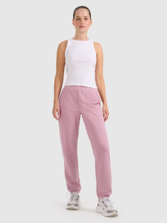 Damskie spodnie dresowe joggery 4F 4FRAW25TTROF1613 - różowe