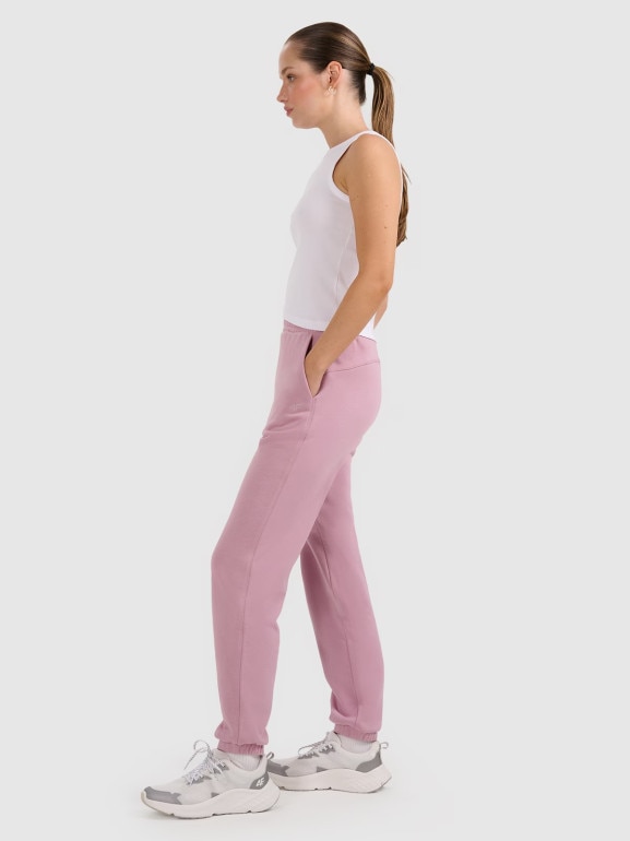 Damskie spodnie dresowe joggery 4F 4FRAW25TTROF1613 - różowe