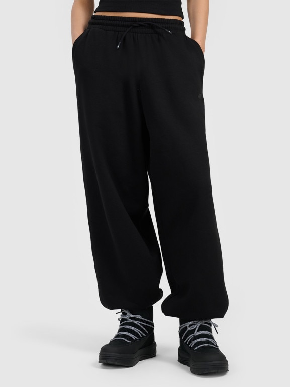 Damskie spodnie dresowe joggery 4F 4FRAW25TTROF1706 - czarne