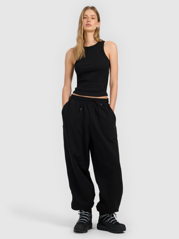 Damskie spodnie dresowe joggery 4F 4FRAW25TTROF1706 - czarne