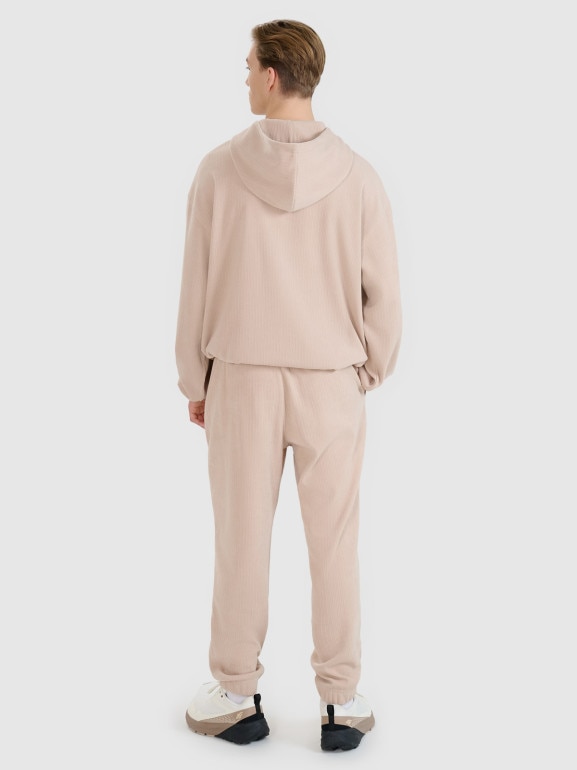 Męskie spodnie dresowe joggery 4F 4FRSS25TTROM1476 - beżowe