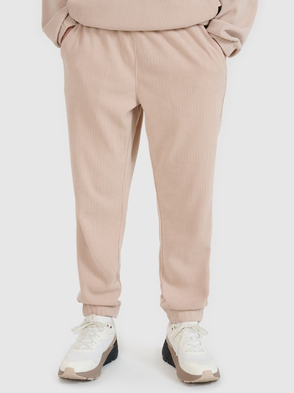 Męskie spodnie dresowe joggery 4F 4FRSS25TTROM1476 - beżowe