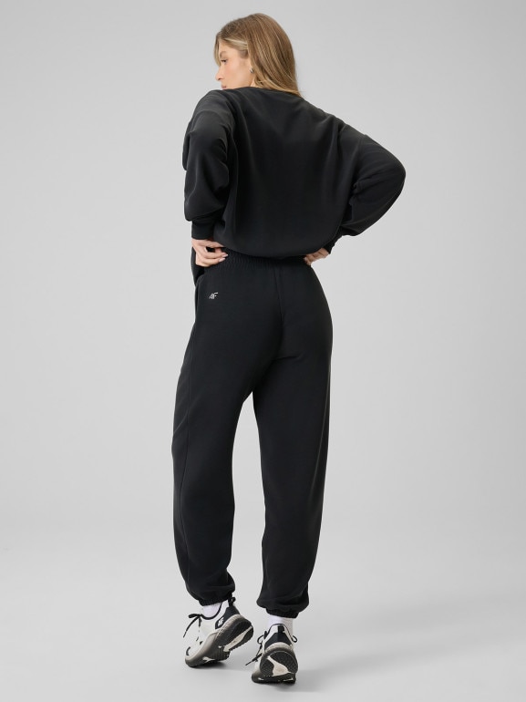 Damskie spodnie dresowe joggery 4F 4FRSS26TTROF1866 - czarne