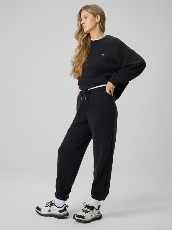 Damskie spodnie dresowe joggery 4F 4FRSS26TTROF1866 - czarne