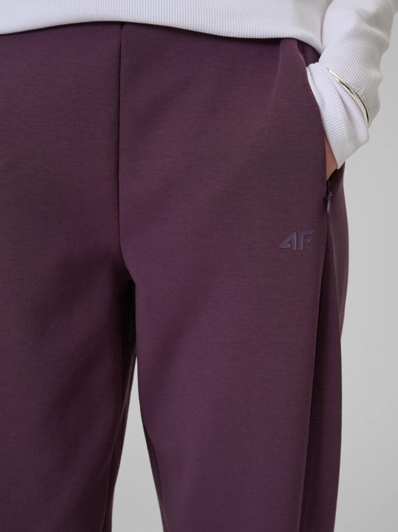 Damskie spodnie dresowe joggery 4F 4FRSS26TTROF1885 - fioletowe