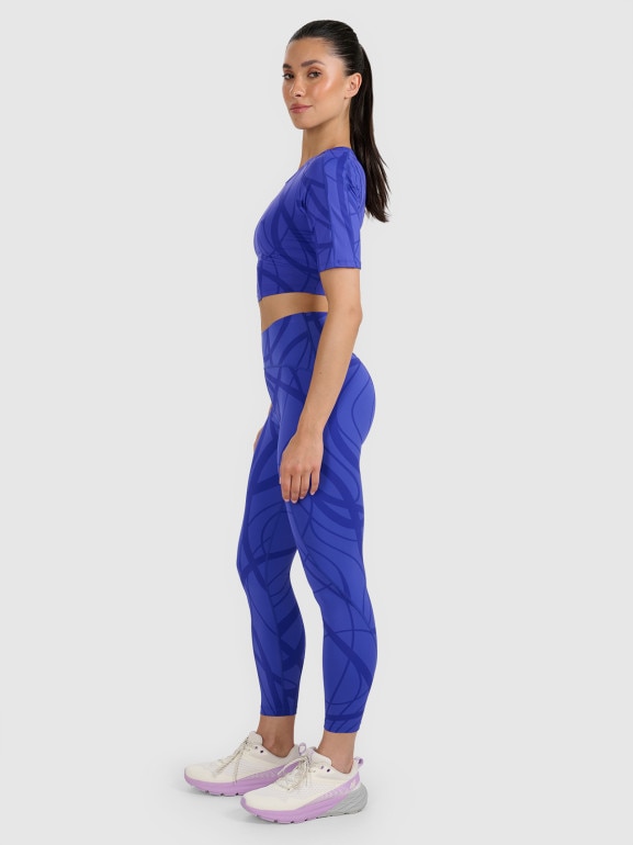 Damski crop top treningowy 4F 4FWAW25TFTSF1520 - niebieski