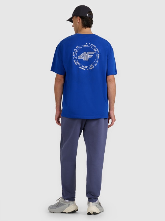 Męskie spodnie dresowe joggery 4F 4FWAW25TTROM1252 - granatowe