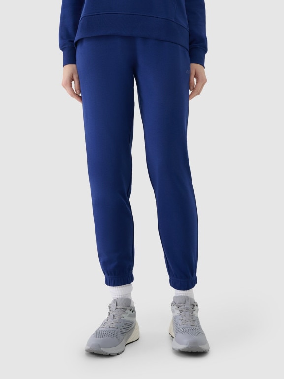 Damskie spodnie dresowe joggery 4F 4FWMM00TTROF1138 - granatowe