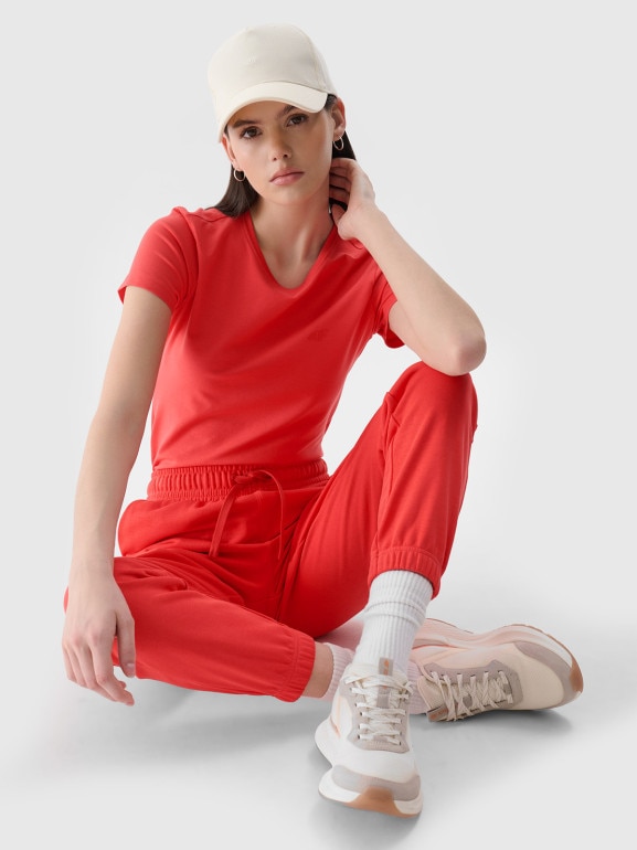 Damskie spodnie dresowe joggery 4F 4FWMM00TTROF1138 - czerwone
