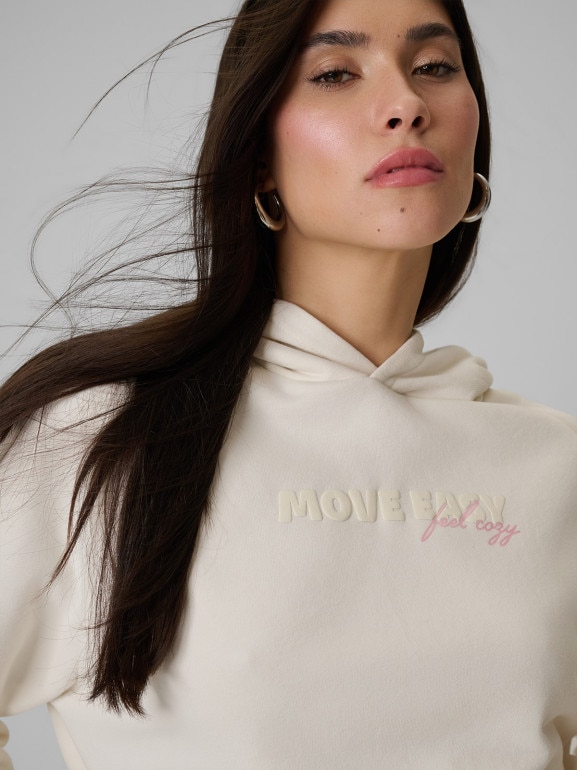 Damska bluza dresowa nierozpinana z kapturem 4F 4FWSS26TSWSF2175 - kremowa