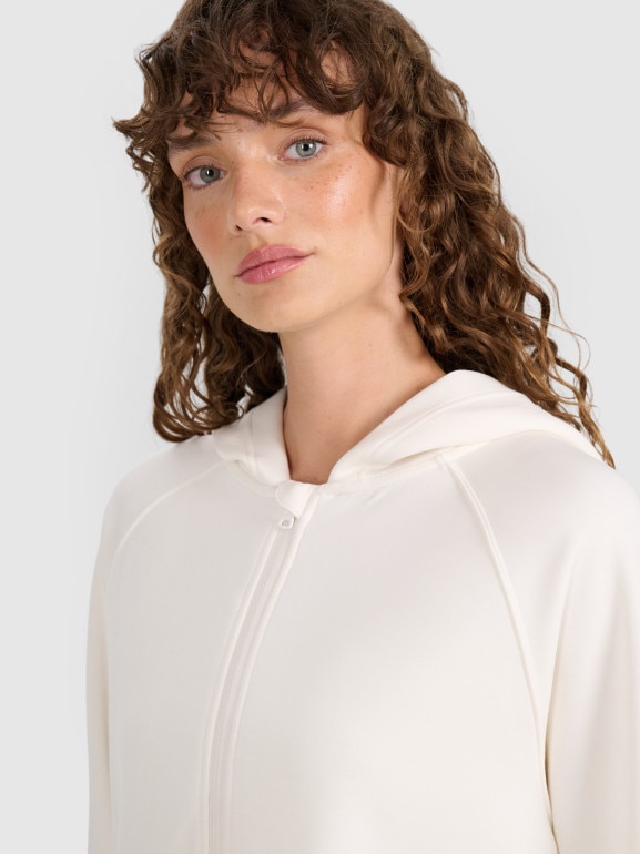 Damska bluza dresowa rozpinana z kapturem 4F 4FWAW25TSWSF1835 - biała