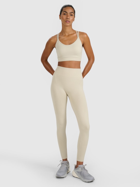 Damski biustonosz treningowy 4F 4FWAW25USBAF218 - beżowy