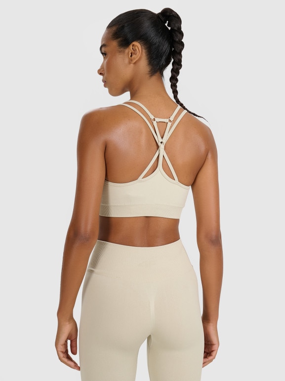 Damski biustonosz treningowy 4F 4FWAW25USBAF218 - beżowy