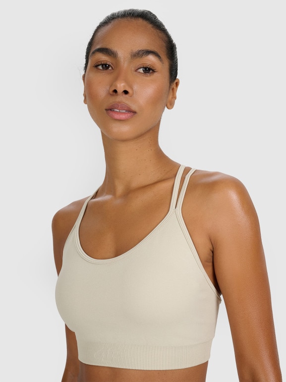 Damski biustonosz treningowy 4F 4FWAW25USBAF218 - beżowy