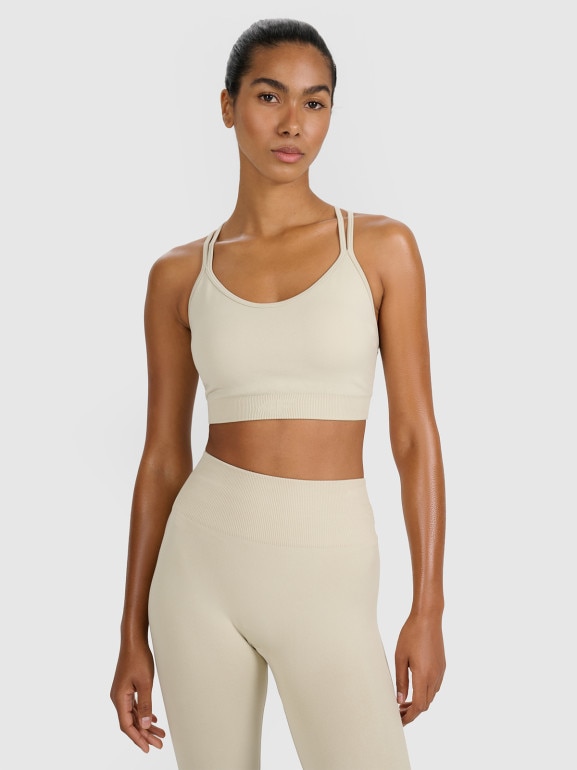 Damski biustonosz treningowy 4F 4FWAW25USBAF218 - beżowy