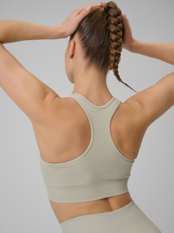 Damski biustonosz treningowy 4F 4FWSS26USBAF242 - beżowy