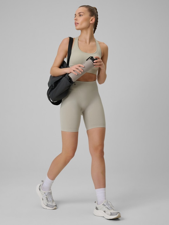 Damski biustonosz treningowy 4F 4FWSS26USBAF242 - beżowy