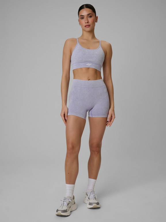 Damski biustonosz treningowy bezszwowy 4F 4FWSS26USBAF203 - fioletowy