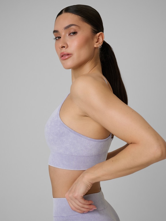 Damski biustonosz treningowy bezszwowy 4F 4FWSS26USBAF203 - fioletowy