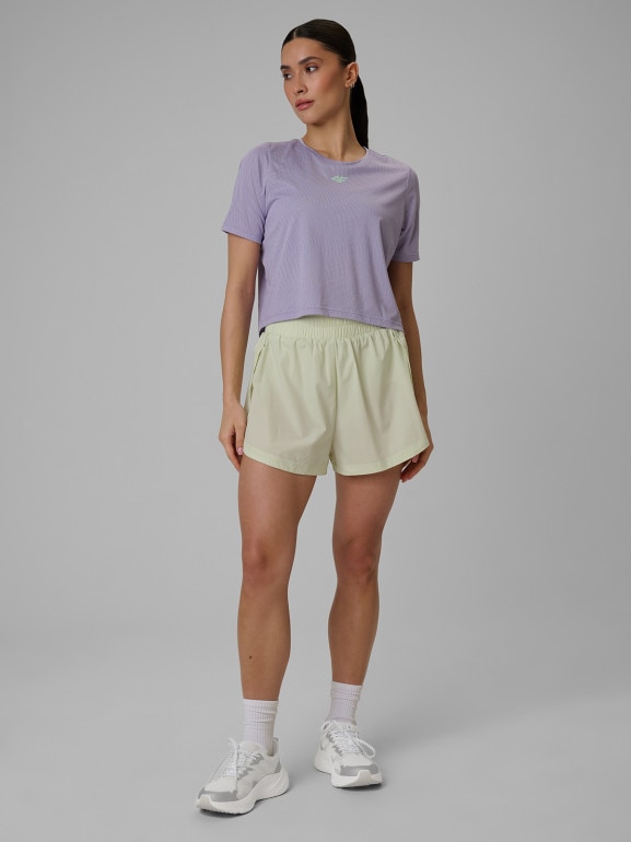 Damski crop top treningowy 4F 4FWSS26TFTSF1806 - fioletowy