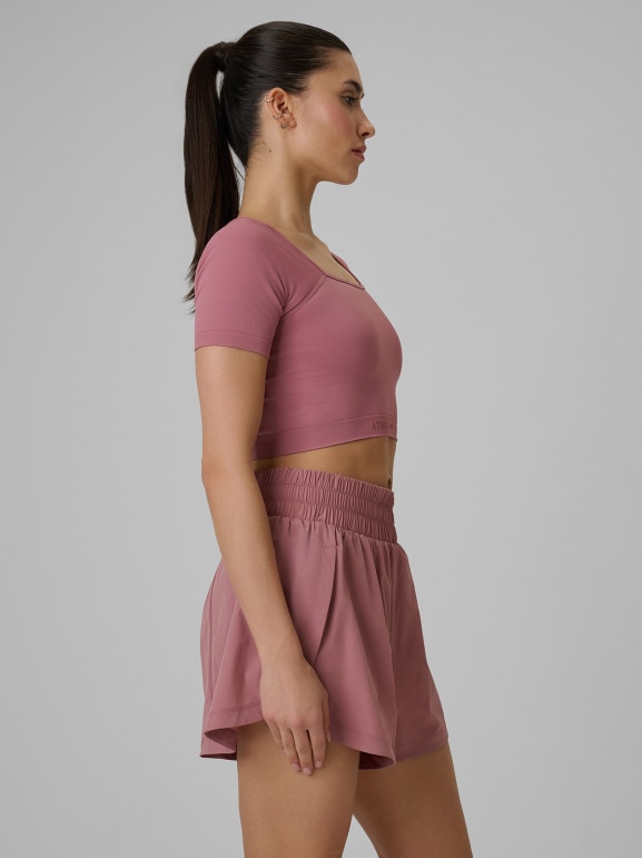 Damski crop top treningowy 4F 4FWSS26TFTSF1812 - różowy