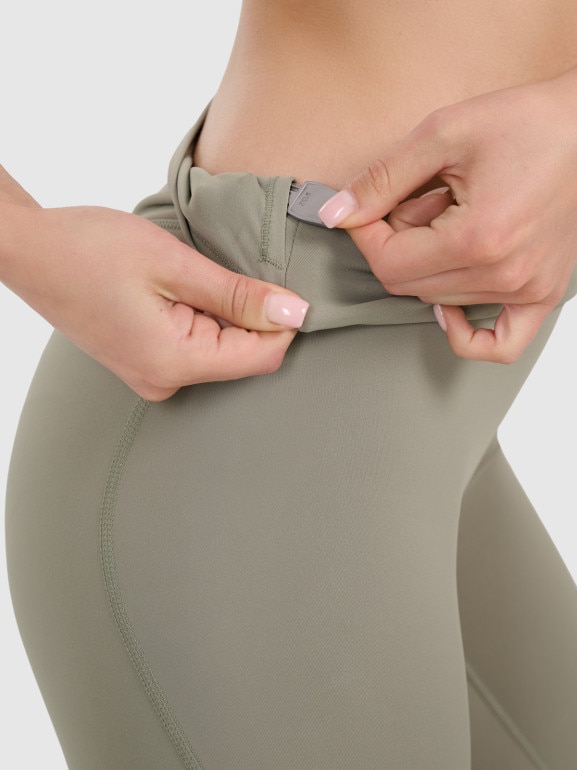 Damskie legginsy do jogi i pilatesu 4F 4FWAW25TFTIF369 - oliwkowe