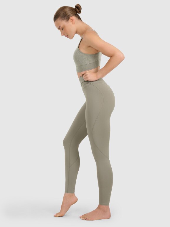 Damskie legginsy do jogi i pilatesu 4F 4FWAW25TFTIF369 - oliwkowe
