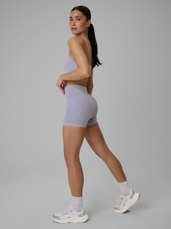 Damskie legginsy krótkie treningowe 4F 4FWSS26TFSTF072 - fioletowe