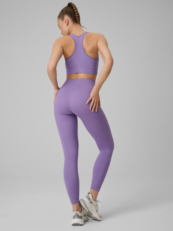Damskie legginsy treningowe 4F 4FWSS26TFTIF420 - fioletowe