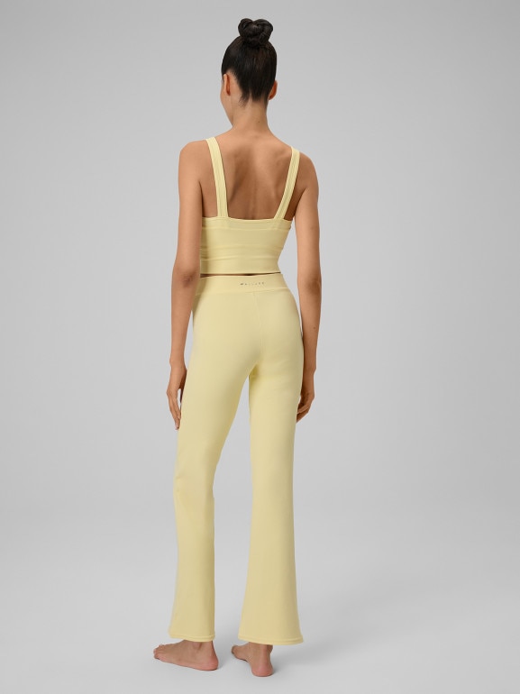 Damskie spodnie do jogi 4F 4FRSS26TFTRF1391 - żółte