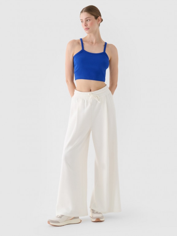 Damskie spodnie dresowe 4F 4FRSS24TTROF1331 - białe