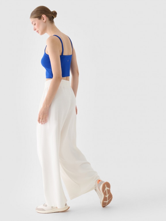 Damskie spodnie dresowe 4F 4FRSS24TTROF1331 - białe