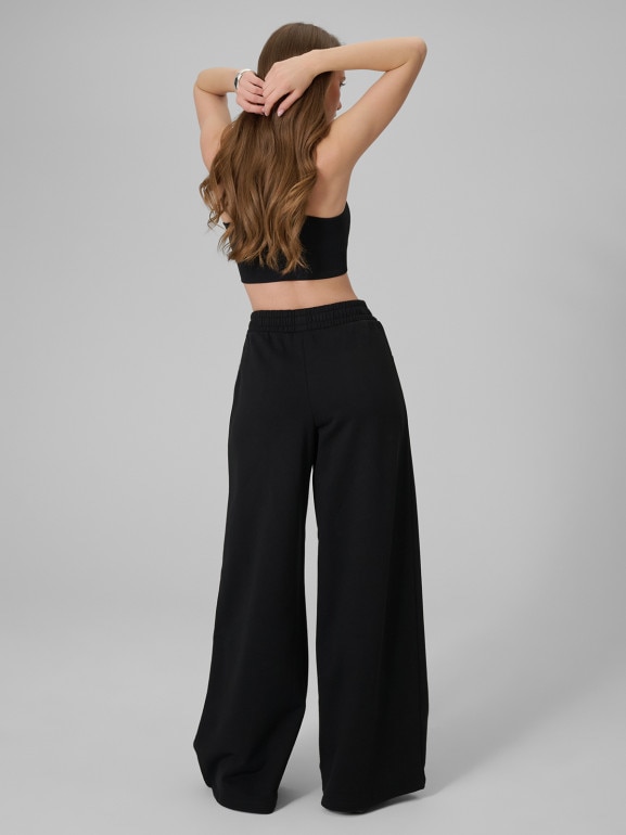 Damskie spodnie dresowe 4F 4FRSS26TTROF2011 - czarne