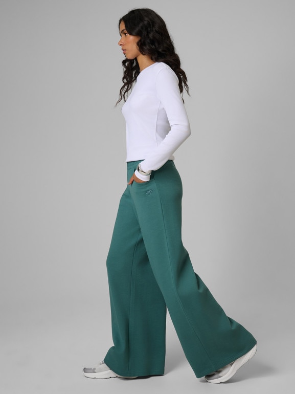 Damskie spodnie dresowe 4F 4FRSS26TTROF2011 - turkusowe