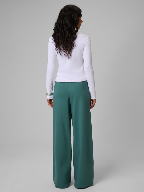 Damskie spodnie dresowe 4F 4FRSS26TTROF2011 - turkusowe