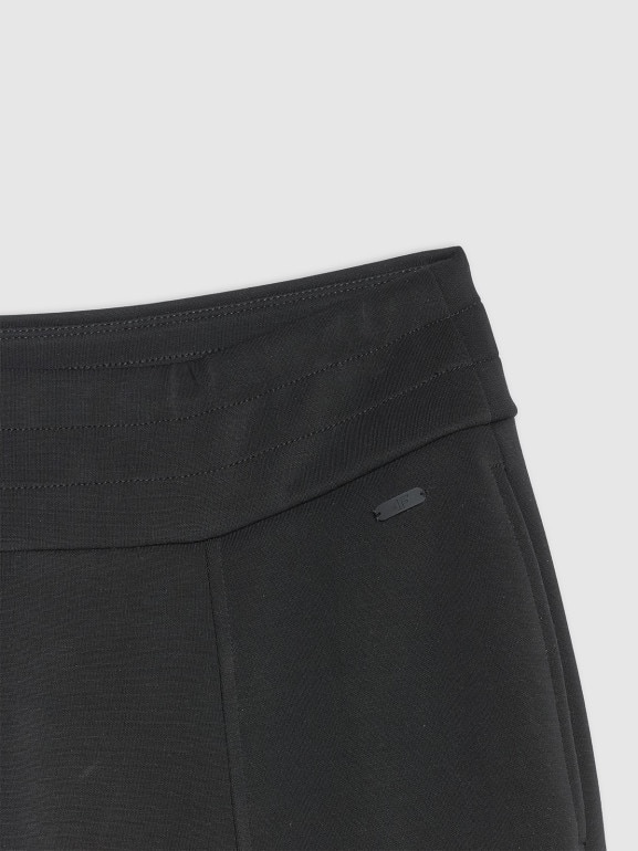 Damskie spodnie dresowe 4F 4FWAW25TTROF1181 - czarne