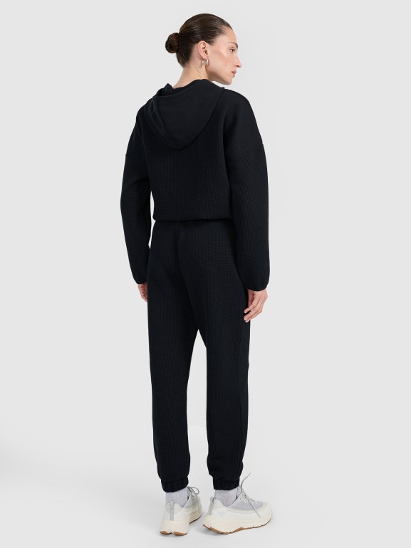 Damskie spodnie dresowe 4F 4FWAW25TTROF1184 - czarne