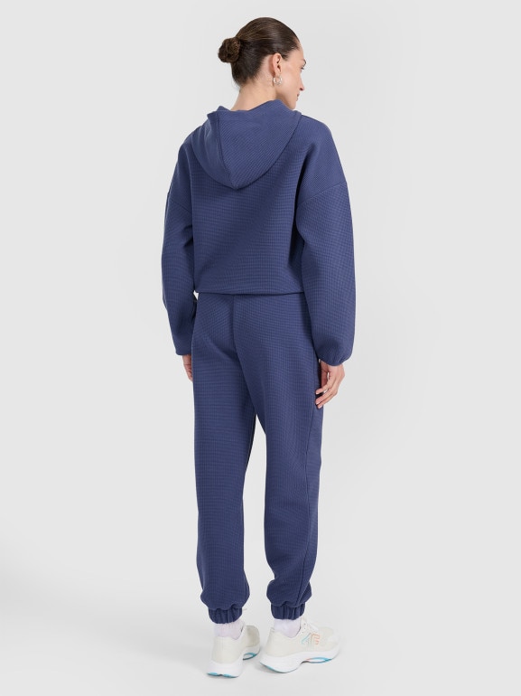 Damskie spodnie dresowe 4F 4FWAW25TTROF1184 - niebieskie