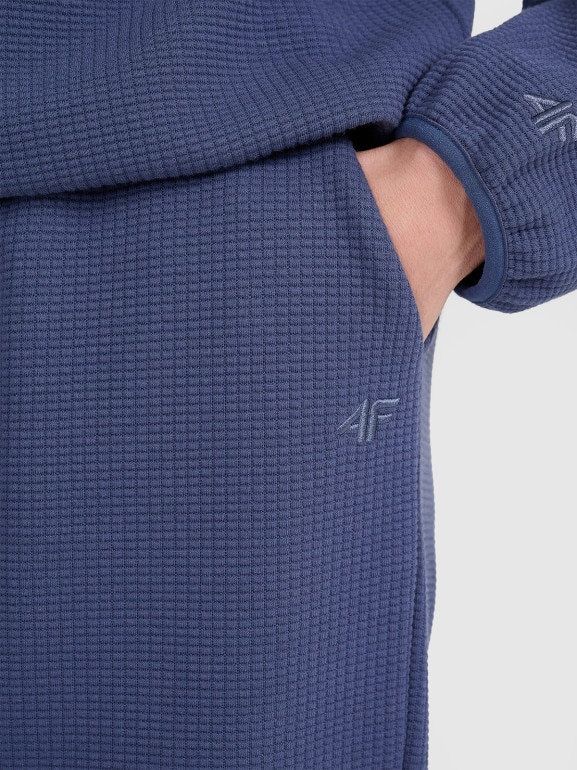 Damskie spodnie dresowe 4F 4FWAW25TTROF1184 - niebieskie