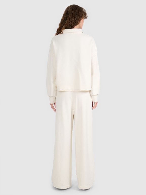 Damskie spodnie dresowe 4F 4FWAW25TTROF1204 - beżowe