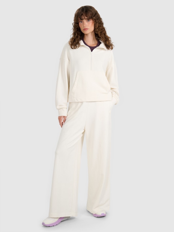 Damskie spodnie dresowe 4F 4FWAW25TTROF1204 - beżowe