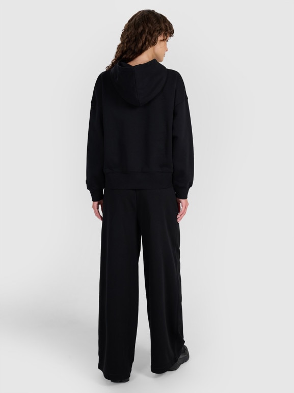 Damskie spodnie dresowe 4F 4FWAW25TTROF1204 - czarne