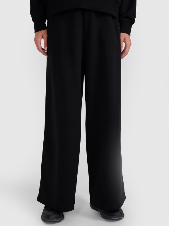 Damskie spodnie dresowe 4F 4FWAW25TTROF1204 - czarne