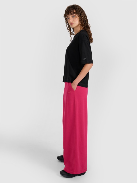 Damskie spodnie dresowe 4F 4FWAW25TTROF1204 - różowe