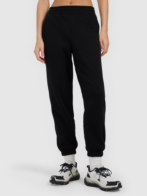 Damskie spodnie dresowe joggery 4F 4FRMM00TTROF1842 - czarne