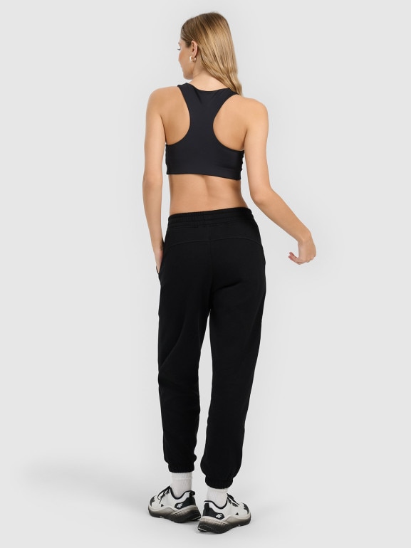Damskie spodnie dresowe joggery 4F 4FRMM00TTROF1842 - czarne